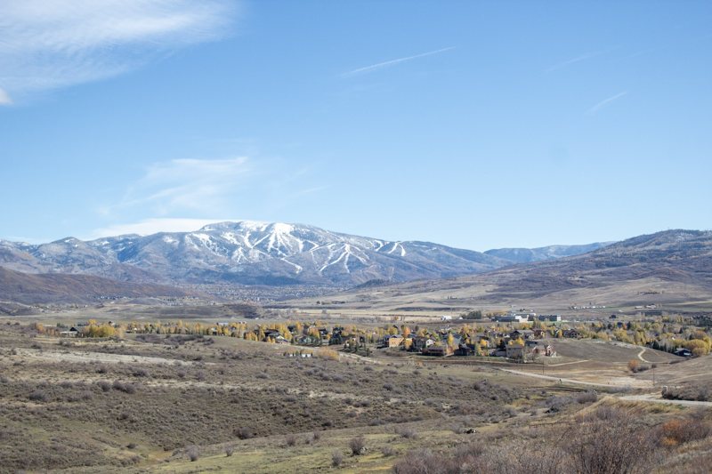 Snow-capped peaks above sagebrush foothills