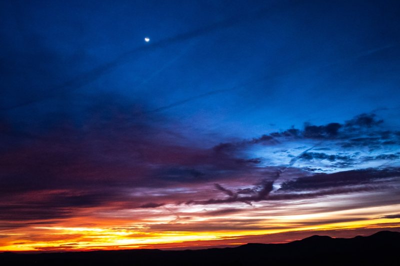 Deep blue twilight with streaks of colorful cloud